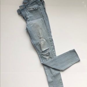 Destroyed light denim skinny jeans